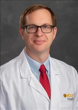 Photo of John Downs, MD, MPH, FACP, FACOEM