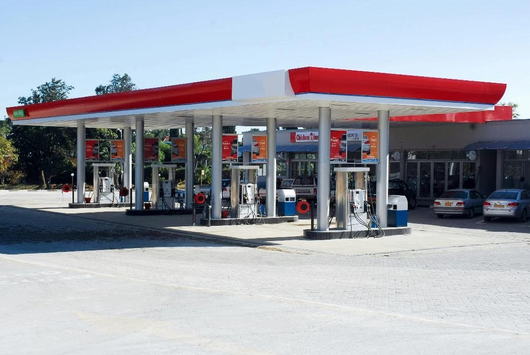Exterior shot of an average gas station in the middle of the day